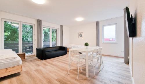 Four-Bedroom Apartment with Balcony 