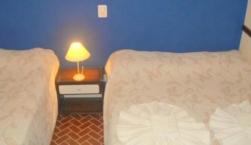 Standard Quadruple Room with Private Bathroom 