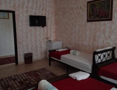 Single Bed in Dormitory Room
