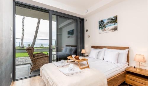 One-Bedroom Apartment with Sea View and Balcony