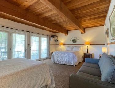 Deluxe Queen Room with Two Queen Beds and Private Bathroom