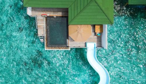 Ocean Villa with Pool + Slide - - Free shared seaplane for 2 guests, minimum 7-night stay