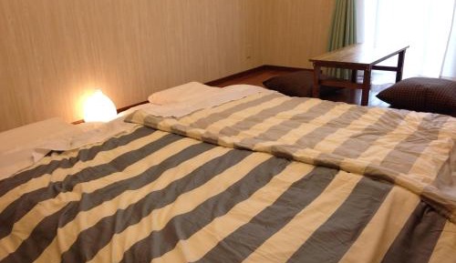 Standard Room with Shared Bathroom