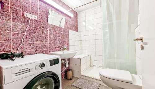 Three-Bedroom Apartment with Balcony