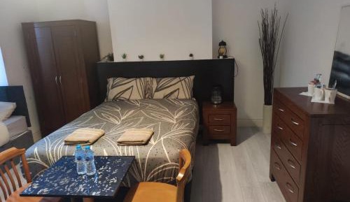 Triple Room with Shared Bathroom