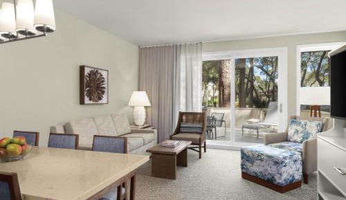 Two-Bedroom Villa with One King Bed, Two Twin Beds, Sofa Bed, Balcony and Garden View