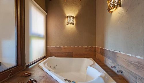 Chalé Master com banheira de hidromassagem