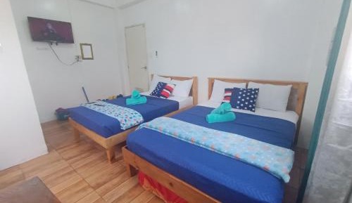 Quadruple Room with Private Bathroom