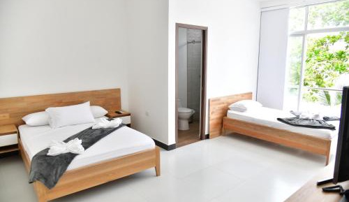 Deluxe Triple Room with Sea View