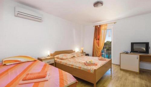 One-Bedroom Apartment with Balcony and Sea View