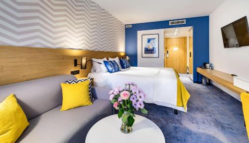 Premium Twin Room with Sofa Bed and Balcony 