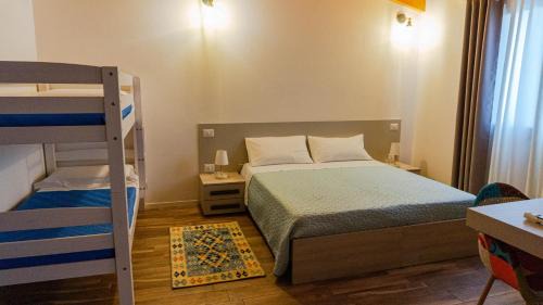 Quadruple Room with Private Bathroom