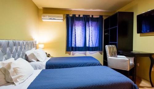 Triple Room (1 Double Bed + 1 Single Bed)