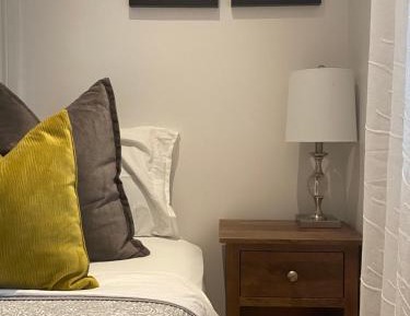 Queen Room with Shared Bathroom