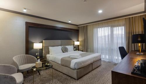 King Suite with Balcony-Treatment included