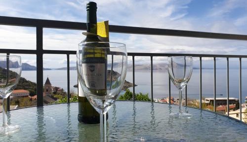 One-Bedroom Apartment with Balcony and Sea View