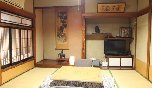 Japanese-Style Family Room with Shared Bathroom
