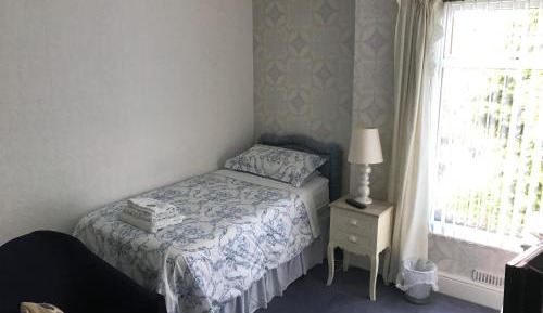 Single Room with Shared Shower and Toilet