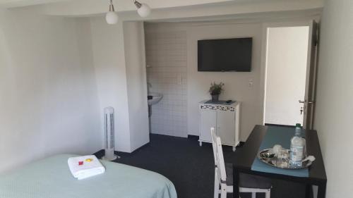 Single Room with Shared Shower and Toilet