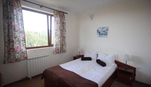One-Bedroom Apartment with Balcony and Mountain View  