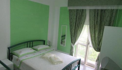 Quadruple Room with Private Bathroom