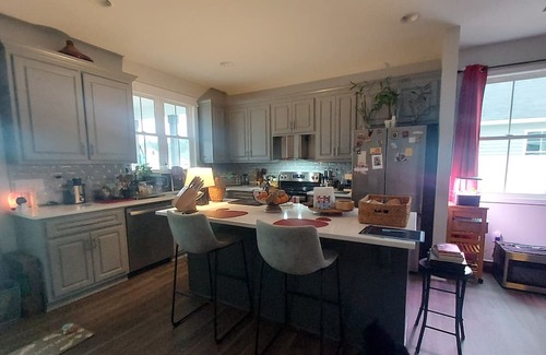 Wilson House | Charming 3 bedroom house in Wilson with AC, WiFi, fitness room, big fenced yard.