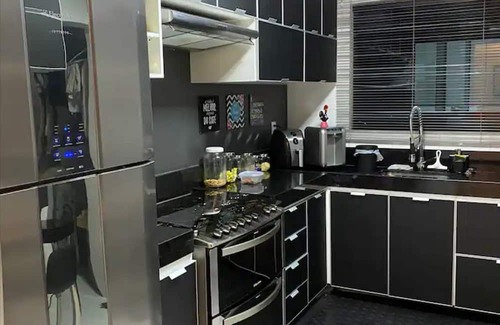 Barreiro de Baixo Apartment | Private Room in Luxury Penthouse in Barreiro BH - Home with Host