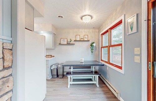 Hazelhurst House | Lakefront home with large patio, fire pit, air hockey & a provided peddle boat