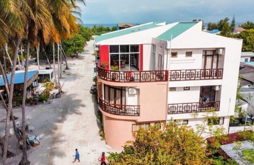 Huraa House | Seaview Suite in Huraa Guesthouse with AC, Wifi & Balcony
