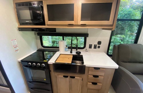 Indianapolis House | Enchanting Tiny Home on Two Wooded Acres with Water Access in Indianapolis