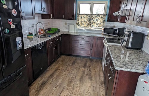 Levittown House | The Hexagon house in the Philadelphia suburbs. Sleeps 9, covered outdoor patio.