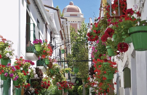 Casares Apartment | Family-friendly Villa-Style 3 Bedroom Apt with Putting Green & Private Garden.
