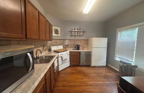 Wichita Falls Cottage | Cozy brown cottage