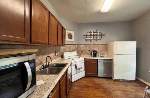 Wichita Falls Cottage | Cozy brown cottage