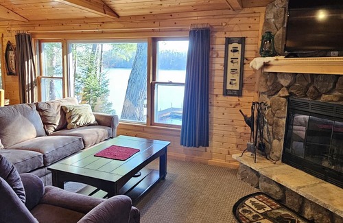 Elcho Cottage | Cozy waterfront cottage on Lower Post Lake. Family- friendly.