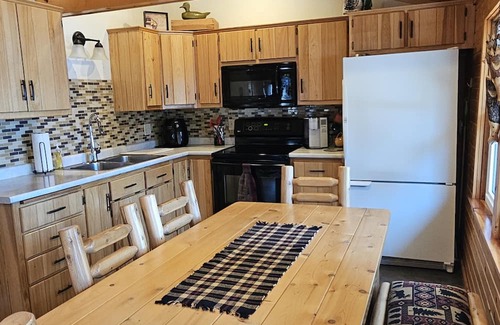 Elcho Cottage | Cozy waterfront cottage on Lower Post Lake. Family- friendly.