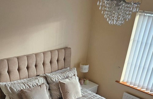 Newcastle House | Semi detached home with garage. 3 bedrooms, 3 bathrooms. Treadmill in garage.