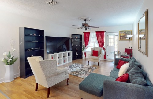Casselberry House | Single-story home with community pool/tennis access, grill, patio, AC, & W/D