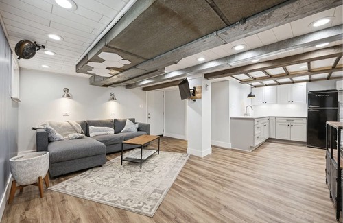 Forest Park Apartment | City-Accessible Basement Retreat