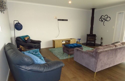 Cable Bay House | Above The Rest is positioned perfect with a view across the bay.