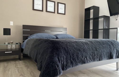 Carmen Apartment | Habitación con Baño Privado y Estacionamiento