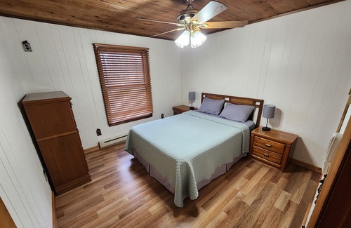 Lake House | Blissful Bluff Lake Retreat: 4BR House with Sandy Beach & Walkout Basement