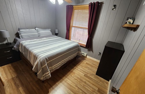 Lake House | Blissful Bluff Lake Retreat: 4BR House with Sandy Beach & Walkout Basement