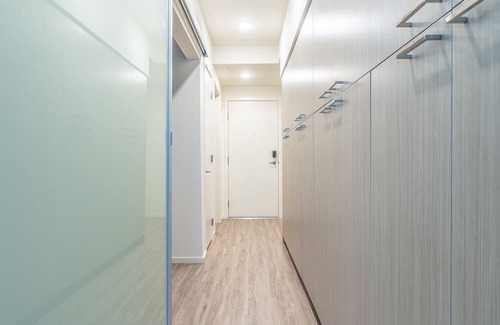Mercer Island Apartment | Chic Mercer island Urban Bedrooms w/ Gym & Roof deck