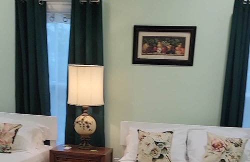 Titusville Bed & Breakfast | Great solar eclipse viewing! Beautiful room, 2 queen beds & private bath.