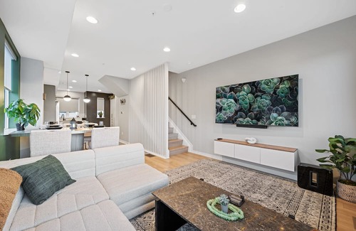 Regis House | Stylish Lakehouse in Denver with Rooftop Hot Tub, Sauna, Mountain Views, Garage