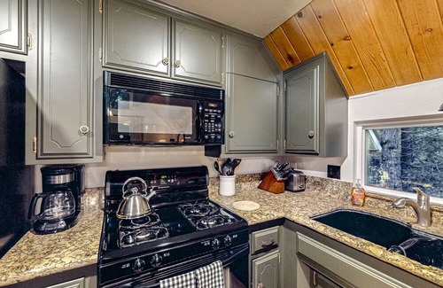 Crestline House | Enchanting lake retreat with fireplace, games, & great deck views - dog-friendly