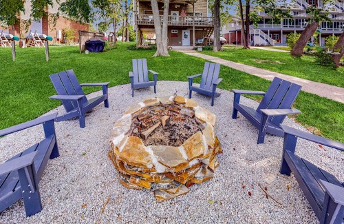 Newberry Shores House | Unique waterfront home with direct water access, dock, firepit, porch, W/D, AC