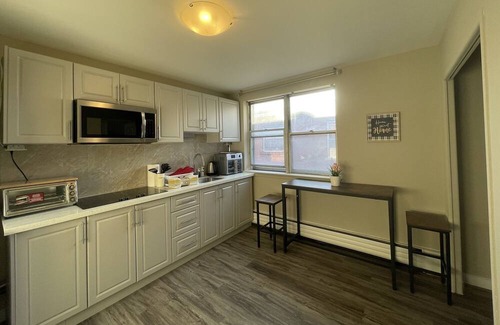 Toronto Apartment | Unit 4D - Large Bedroom with private bathroom, work desk, WI-FI and parking