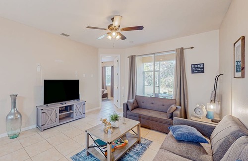 Haines City House | Townhouse near the lake with outdoor pool, hot tub, patio, streaming, W/D, & AC
